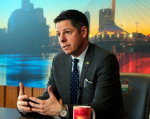 BORIS MINKEVICH / WINNIPEG FREE PRESS
City of Winnipeg Mayor Brian Bowman gets interviewed by Aldo Santin in his office at City Hall. ALDO SANTIN STORY Dec. 19, 2017