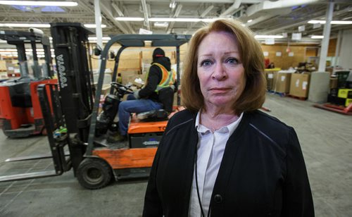 MIKE DEAL / WINNIPEG FREE PRESS 
Kate Brenner, Executive Director at Winnipeg Harvest, in the warehouse where all the foodstuffs get sorted and packaged into hampers.
171219 - Tuesday, December 19, 2017.
