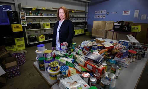 MIKE DEAL / WINNIPEG FREE PRESS 
Kate Brenner, Executive Director at Winnipeg Harvest, in the warehouse where all the foodstuffs get sorted and packaged into hampers.
171219 - Tuesday, December 19, 2017.