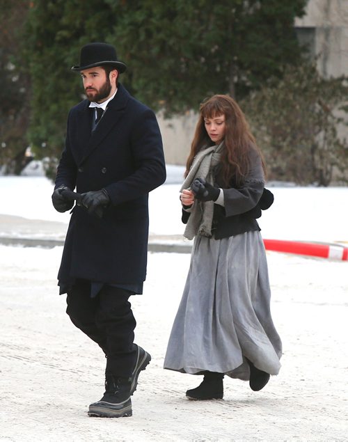 WAYNE GLOWACKI / WINNIPEG FREE PRESS

Actors Christina Ricci and Josh Bowman walk to a shooting location on the Manitoba Legislative grounds Wednesday. Ricci is taking on the role of¤a heroic journalist Nellie Bly, in the  TV movie that will air sometime in 2018. Bly, whose real name was Elizabeth Jane Cochran, was a pioneering undercover journalist and the film examines the chapter of her adventurous life in which she feigned madness to gain entry into a mental hospital in New Yorks Roosevelt Island (known in 1887 as Blackwells Island). The cruelty and abuse she exposed there helped change the mental-health-care system. Directed by Karen Moncrieff, the¤TV movie production is scheduled to be here¤until Dec. 21. Dec. 20  2017
