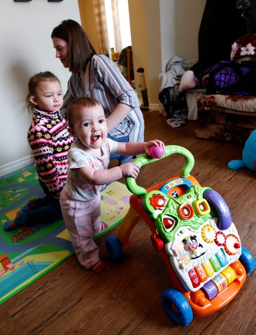WAYNE GLOWACKI / WINNIPEG FREE PRESS

Ashton Kehler and daughters, one year old  Lily at right who is starting to walk and Aria,3.  A year ago, a miraculous surgery led to a most unique delivery of Lily at HSC.Alex Paul story  Dec. 20  2017
