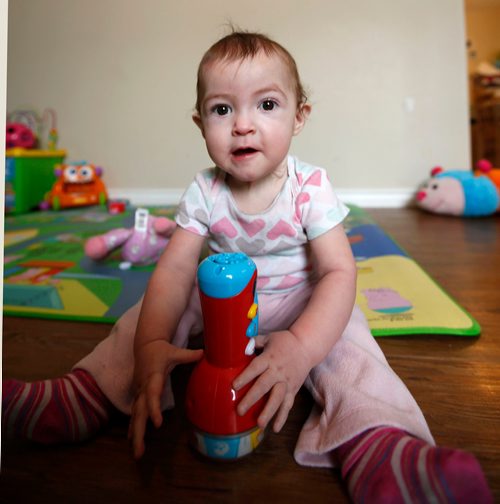 WAYNE GLOWACKI / WINNIPEG FREE PRESS

One year old Lily, the daughter of Ashton Kehler. A year ago, a miraculous surgery led to a most unique delivery of Lily at HSC. Alex Paul story  Dec. 20  2017