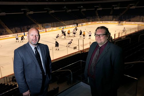 WAYNE GLOWACKI / WINNIPEG FREE PRESS

Winnipeg Free Press Sports writers Jason Bell,left, and Mike McIntyre in Bell MTS Place.  Dec. 21  2017