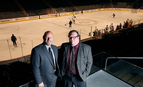 WAYNE GLOWACKI / WINNIPEG FREE PRESS

Winnipeg Free Press Sports writers Jason Bell,left, and Mike McIntyre in Bell MTS Place.  Dec. 21  2017