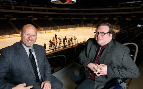 WAYNE GLOWACKI / WINNIPEG FREE PRESS

Winnipeg Free Press Sports writers Jason Bell,left, and Mike McIntyre in Bell MTS Place.  Dec. 21  2017