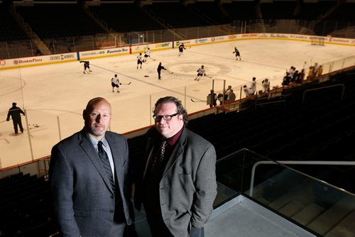 WAYNE GLOWACKI / WINNIPEG FREE PRESS

Winnipeg Free Press Sports writers Jason Bell,left, and Mike McIntyre in Bell MTS Place.  Dec. 21  2017