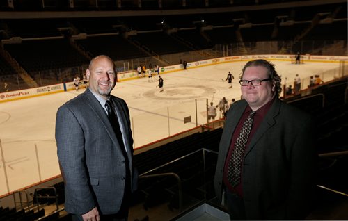 WAYNE GLOWACKI / WINNIPEG FREE PRESS

Winnipeg Free Press Sports writers Jason Bell,left,  and Mike McIntyre in Bell MTS Place.  Dec. 21  2017