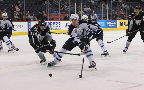 RUTH BONNEVILLE / WINNIPEG FREE PRESS

Manitoba Moose player  #50 Jack Roslovic tries to keep control of the puck as  San Antonio Rampage #94Andrej Mironov battles alongside hime during 2nd period of play at MTS Centte Thursday evening.  

Dec 21, 2017
