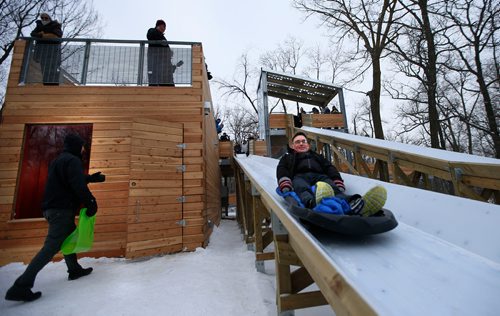 WAYNE GLOWACKI / WINNIPEG FREE PRESS

City Councillor Brian Mayes takes a ride after the official opening of the St.Vital Parks new treetop lookout, toboggan slides and warming shelter Friday. Kiera Kowalski story Dec. 22  2017