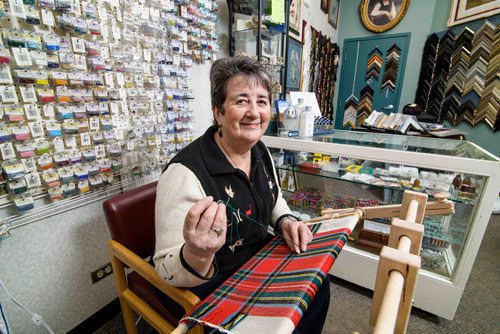 Sheena Buckner, owner of Sheenas Needle Art Gallery working on a tartan, both representing her Scottish heritage and the fifteen years her gallery has been open at the current location. Dec. 21, 2017 Mike Sudoma // Winnipeg Free Press