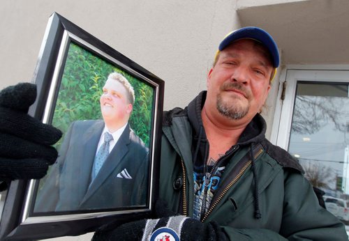 BORIS MINKEVICH / WINNIPEG FREE PRESS
Kevin Joss poses for a photo with some photos of his son Cody. For crime story on the Cody Joss hit and run from 2014 where Cody died and the driver of the vehicle that hit him has never been caught. Dave Baxter story. Dec. 22, 2017
