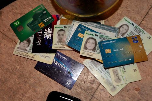 BORIS MINKEVICH / WINNIPEG FREE PRESS
Some of the stuff in the The Pyramid Cabaret lost and found for a story about venue lost and founds. Lots of ID and credit cards. Erin Lebar story. Dec. 22, 2017