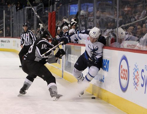 RUTH BONNEVILLE / WINNIPEG FREE PRESS

Manitoba Moose #48 Brendan Lemieux gets squashed up against the boards while battling  San Antonio Rampage #18 Felix Girard  during 2nd  period action at MTS Centre Friday night.   Score after the 2nd period is 2 - 1 for Moose.   


Dec 22, 2017
