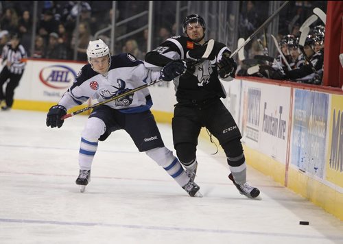 RUTH BONNEVILLE / WINNIPEG FREE PRESS

Manitoba Moose #8 Sami Niku uses his stick to slow down San Antonio Rampage #23 Shawn St. Amant during 3rd period action at MTS Centre Friday night.   

Dec 22, 2017
