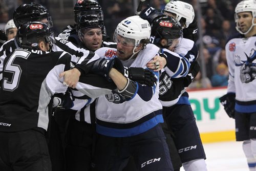 RUTH BONNEVILLE / WINNIPEG FREE PRESS

Manitoba Moose #48 Brendan Lemieux gets into a brawl with  San Antonio Rampage players and refs during game at MTS Centte. 

Dec 22, 2017
