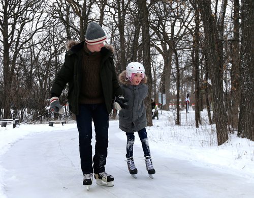 WAYNE GLOWACKI / WINNIPEG FREE PRESS

Christopher Kurys and his daughter Sadie were out with the family on the Terry Fox Fitness  Skating Trail at¤Assiniboine Park that opened Saturday. It's a one-way,¤1-km trail loop that starts at the warming hut just by the parks main entrance off Corydon Ave & Roblin Blvd.  Dec. 23  2017