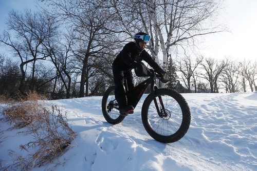 JOHN WOODS / WINNIPEG FREE PRESS
Alex Man was seen on his fat bike riding the monkey trails  at Assiniboine Park Monday, December 25, 2017. He said he was "working for his turkey." Windchill is expected to reach -41 in Winnipeg.