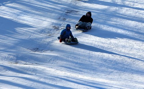 RUTH BONNEVILLE / WINNIPEG FREE PRESS

Will Kulesza  (7yrs,front)  and  Lee Froese, family friend visiting from Victoria, enjoy tobogganing at Assiniboine Park Tuesday morning despite the extreme cold temperatures.    

See extreme cold,  weather story.  


Dec 26, 2017
