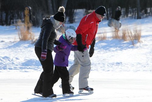 RUTH BONNEVILLE / WINNIPEG FREE PRESS

Siena Liba (7yrs) holds her parents, Chris and Carolyn's hand as they skate together on the Assiniboine Park Duck Pond Tuesday morning.  
See extreme cold,  weather story.  


Dec 26, 2017
