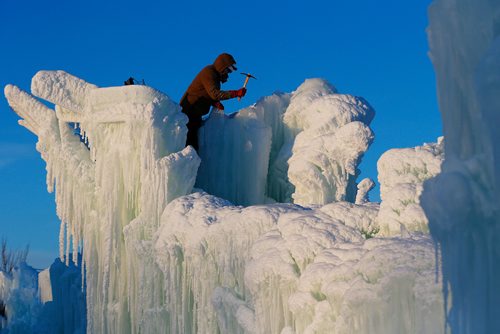 JOHN WOODS / WINNIPEG FREE PRESS
Ice crew member Chris Moskal works on the Ice Castle at the Forks Tuesday, December 26, 2017. Management says they plan on opening in January, but people can check their website ice castles.com or their social media for updates.