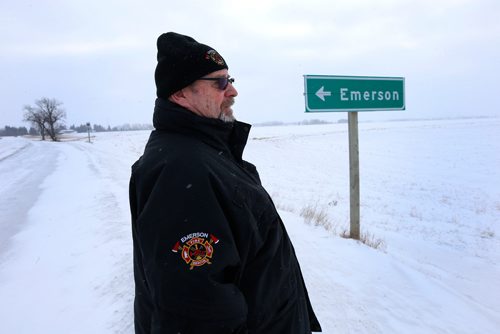WAYNE GLOWACKI / WINNIPEG FREE PRESS 

Doug Johnston, Councillor, Municipality of Emerson-Franklin stands on the international border road on the outskirts to Emerson, he is looking out into Minnesota  Thursday. Dylan Robertson story   Dec. 28  2017