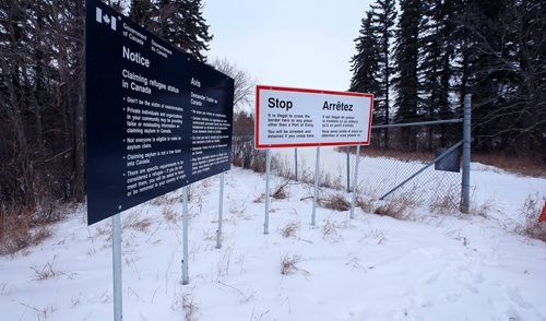 WAYNE GLOWACKI / WINNIPEG FREE PRESS 

Signage in Canada  just metres from the U.S. border close to  the former US Customs And Border Protection - Port Of Entry in Noyes, Minnesota where many border crossers have passed by to enter Canada.    Dylan Robertson story   Dec. 28  2017