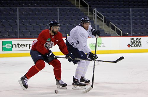 RUTH BONNEVILLE / WINNIPEG FREE PRESS

Winnipeg Jets players Blake Wheeler #26 and  Julian  Melchiori  #71 try and gain control of the puck during practice at  MTS Centre Thursday.


Dec 28, 2017
