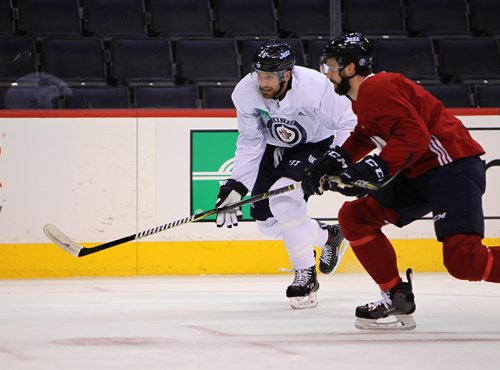 RUTH BONNEVILLE / WINNIPEG FREE PRESS

Winnipeg Jets players Blake Wheeler #26 and  Julian  Melchiori  #71 race down the ice for the puck during practice at  MTS Centre Thursday.


Dec 28, 2017
