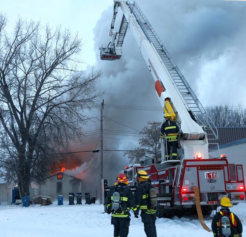 WAYNE GLOWACKI / WINNIPEG FREE PRESS 

Winnipeg Fire Fighters battle a three storey rooming house fire Friday morning on Pritchard Ave. The fire in the 200 block of Pritchard Ave. started approximately 7A.M.   Dec. 29  2017