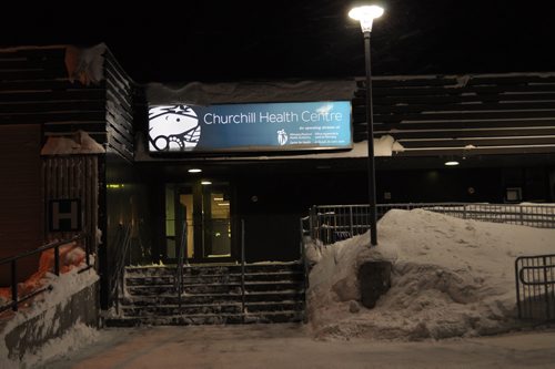Dylan Robertson / Winnipeg Free Press
Two signs are seen outside the Churchill Health Centre. One sign indicates it's a hospital, while the other doesn't, stoking fears that the community's contracting health services will be reduced to a simple nursing station.
171206 - Wednesday, December 06, 2017.