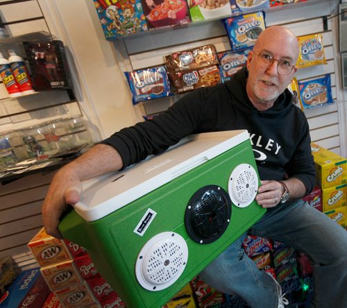 PHIL HOSSACK / Winnipeg Free Press - Intersection - Doug Touchette poses with some of his suitcase "BoomBox" creations. This version is a coleman cooler converted to a waterproof sound system that holds 15 long neck beer bottles. See Dave Sanderson's story.  December 29, 2017