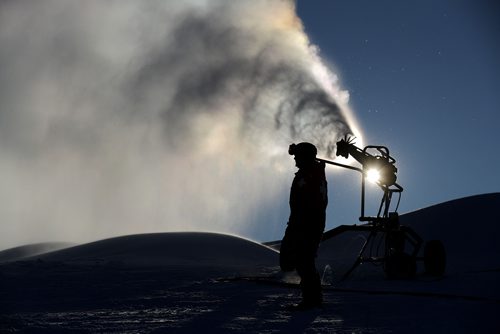 TREVOR HAGAN / WINNIPEG FREE PRESS
Robert Paige, Ski Patrol, at Spring Hill, monitoring a snow gun. It was too cold to be open for business, but the weather was perfect for making snow, Saturday, December 30, 2017.