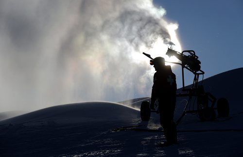 TREVOR HAGAN / WINNIPEG FREE PRESS
Robert Paige, Ski Patrol, at Spring Hill, monitoring a snow gun. It was too cold to be open for business, but the weather was perfect for making snow, Saturday, December 30, 2017.