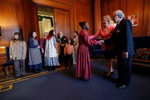 JOHN WOODS / WINNIPEG FREE PRESS
Rebecca Rieder says happy new year to Lt.-Gov. Janice Filmon and her husband Gary as the Rieder family looks on at the annual New Years Levee at the legislative building Monday, January 1, 2018.