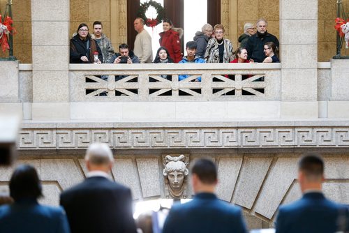 JOHN WOODS / WINNIPEG FREE PRESS
People listen to the Military Family Resource Centre Choir at the annual New Years Levee at the legislative building Monday, January 1, 2018.