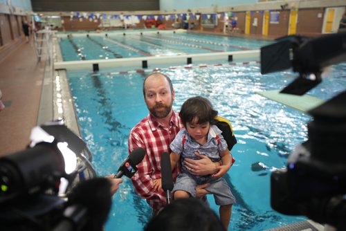 RUTH BONNEVILLE / WINNIPEG FREE PRESS

City of Winnipeg holds presser on their new pilot program to provide school-aged children basic swim and water safety skills at  presser held next to pool at Cindy Klassen Recreation Complex Wednesday.  
Winnipeg School Division Trustee Kevin Freedman with his son, Daru Freedman (2yrs), talks to the press after news conference.  


Jan 03, 2018
