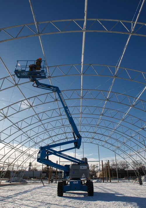 MIKE DEAL / WINNIPEG FREE PRESS
Jared Desmottes and Jeff Andrews work in -24C weather installing the framework for the new canopy for the St. Norbert Farmers Market.
180103 - Wednesday, January 03, 2018.