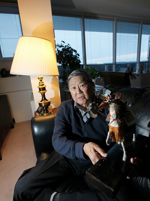 PHIL HOSSACK / WINNIPEG FREE PRESS - Art Miki is one more of the last eyewitnesses to bad things in history. His story is the internment of Japanese Canadians during the Second World War. He's posing in his Winnipeg Apartment showing off a samori doll, one of several he found in his mothers steamer trunk, she saved the traditional dolls as the family was forced from there home and into interrment during the second world war. Rollason's story. January 3, 2018