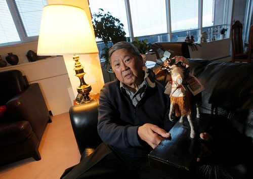 PHIL HOSSACK / WINNIPEG FREE PRESS - Art Miki is one more of the last eyewitnesses to bad things in history. His story is the internment of Japanese Canadians during the Second World War. He's posing in his Winnipeg Apartment showing off a samori doll, one of several he found in his mothers steamer trunk, she saved the traditional dolls as the family was forced from there home and into interrment during the second world war. Rollason's story. January 3, 2018