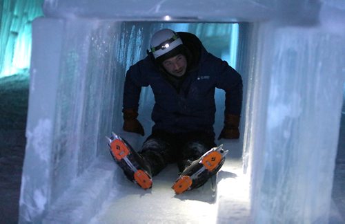 JASON HALSTEAD / WINNIPEG FREE PRESS

A staff member works on an ice slide during a preview event at the Ice Castles attraction at Parks Canada Place at The Forks on Jan. 4, 2018. Ice Castles will open to the public on Jan. 5, 2018. (See Carol Sanders story)