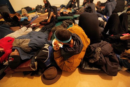 PHIL HOSSACK / Winnipeg Free Press -  Safe, warm and a hot meal for a homeless man  on his communal bed Thursday evening at the Winnipeg Project's shelter. See Jen Zorati's story. -   January 4, 2018