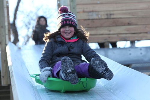 RUTH BONNEVILLE / WINNIPEG FREE PRESS

Serenity Carmo (8yrs) enjoys sliding on  the new toboggan slide at St. Vital Park during her winter holidays Friday afternoon.  

Standup photo 

Jan 05, 2018
