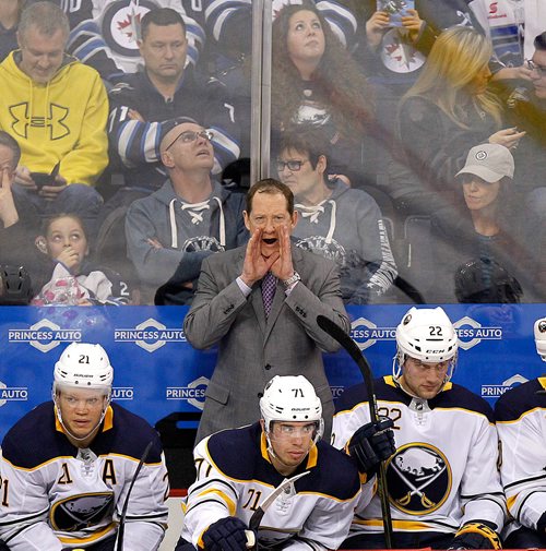 PHIL HOSSACK / Winnipeg Free Press -   January 4, Buffalo Sabres Head Coach Phil Housley sends signals in the first period THursday at Bell MTS Place as the Sabres took opn the Winnipeg Jets. January 5, 2018