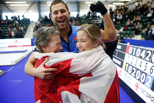JOHN WOODS / WINNIPEG FREE PRESS
Kaitlyn Lawes with her mother Cheryl and John Morris celebrate defeating Brad Gushue and Val Sweeting in the Mixed Doubles Curling Trials in Portage La Prairie Sunday, January 7, 2018. Lawes and Morris will represent Canada at the 2018 Winter Olympics in Korea.
