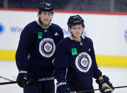 BORIS MINKEVICH / WINNIPEG FREE PRESS
Winnipeg Jets practice at Bell MTS Place. From left, Patrik Laine and Nikolaj Ehlers were a few players on the ice for a short time. Mike McIntyre story. January 8, 2018