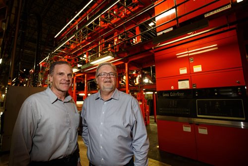 MIKE DEAL / WINNIPEG FREE PRESS
Rick Swiergosz Operations and Distribution Manager and Gord Smith Pressroom Manager stand by the mammoth presses in the Winnipeg Free Press pressroom.
180108 - Monday, January 08, 2018.