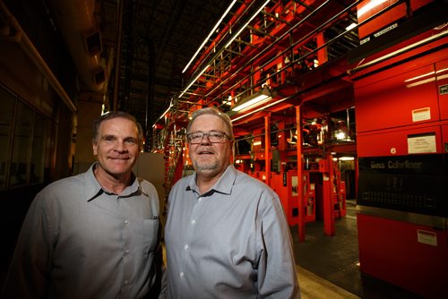MIKE DEAL / WINNIPEG FREE PRESS
Rick Swiergosz Operations and Distribution Manager and Gord Smith Pressroom Manager stand by the mammoth presses in the Winnipeg Free Press pressroom.
180108 - Monday, January 08, 2018.