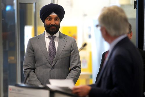 PHIL HOSSACK / Winnipeg Free Press -  Navdeep Bains, federal Minister of Innovation, Science and Economic Development and Minister responsible for Western Economic Diversification is announcing more than $6 million in funding for a handful of economic development agencies in Winnipeg. Here's he's introduced to the audience of about 50 at the Composites Innovation Centre by the Honorable Jim Carr. - January 8, 2018