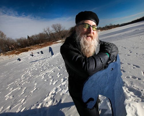 PHIL HOSSACK / Winnipeg Free Press -  Jordan Van Sewel poses on the Red River with a set of horse head silouettes he's installed on the ice. See Doug Spiers story.  - January 9, 2018