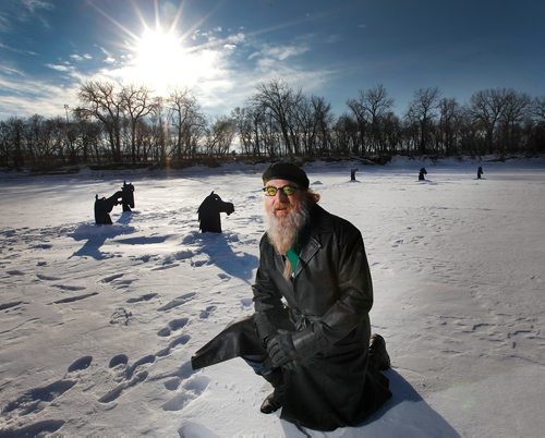 PHIL HOSSACK / Winnipeg Free Press -  Jordan Van Sewel poses on the Red River with a set of horse head silouettes he's installed on the ice. See Doug Spiers story.  - January 9, 2018